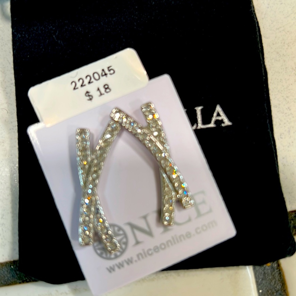 Silver tone in a X style with Diamonds accent